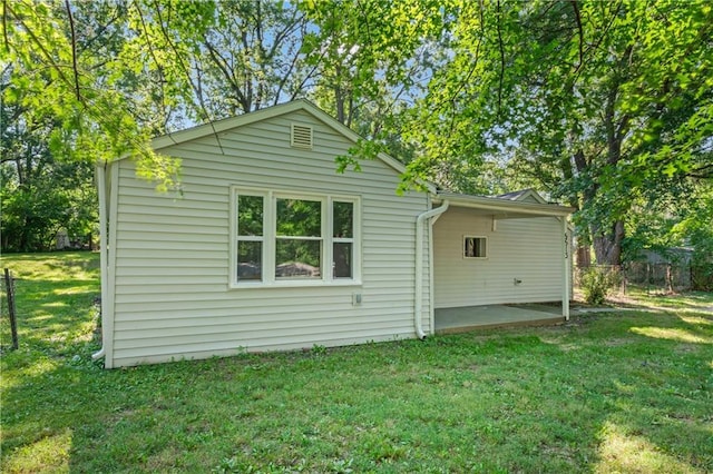 5513 Hardy Ave, Raytown, MO 64133 - rear view of property with a patio