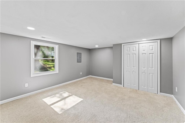 5513 Hardy Ave, Raytown, MO 64133 - unfurnished bedroom with electric panel, carpet flooring, recessed lighting, and a closet