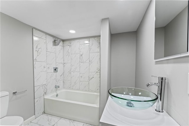 5513 Hardy Ave, Raytown, MO 64133 - full bath featuring marble finish flooring,  shower combination, and recessed lighting
