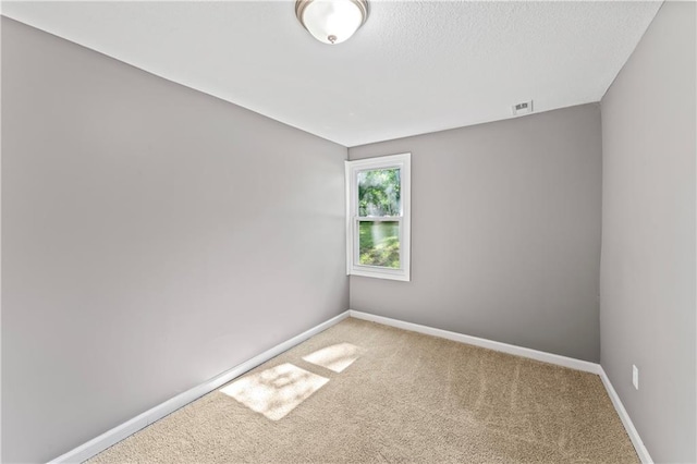 5513 Hardy Ave, Raytown, MO 64133 - unfurnished room with carpet and baseboards
