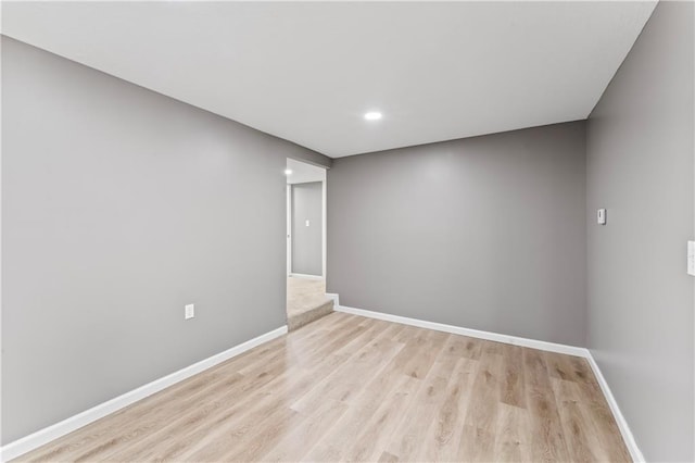 5513 Hardy Ave, Raytown, MO 64133 - empty room featuring light wood-type flooring and recessed lighting