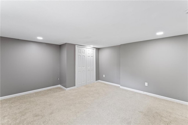5513 Hardy Ave, Raytown, MO 64133 - finished basement featuring carpet floors and recessed lighting