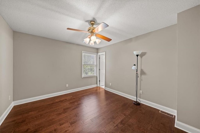 11927 W 131st Ter, Overland Park, KS 66213 - unfurnished room featuring ceiling fan, wood finished floors, and a textured ceiling