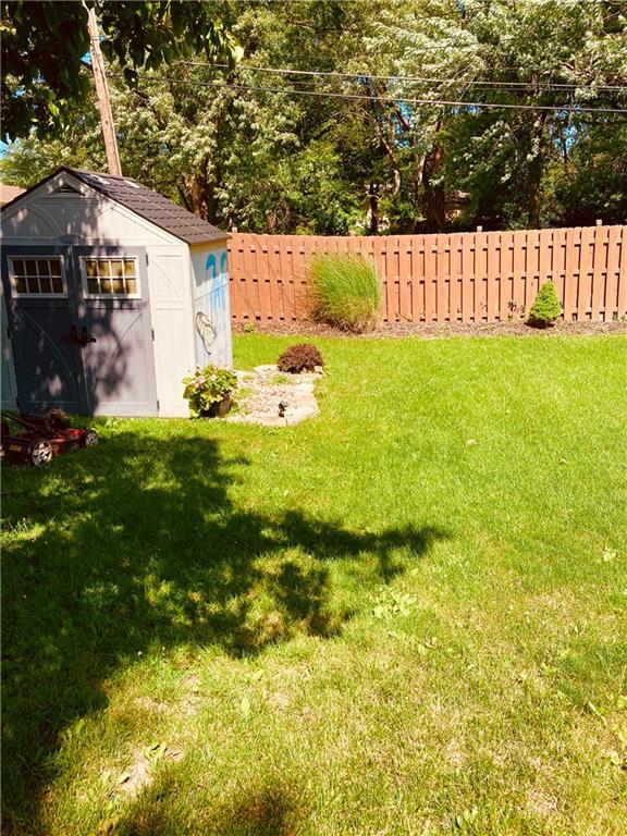 7909 Appleton Ave, Raytown, MO 64138 - view of yard with a shed