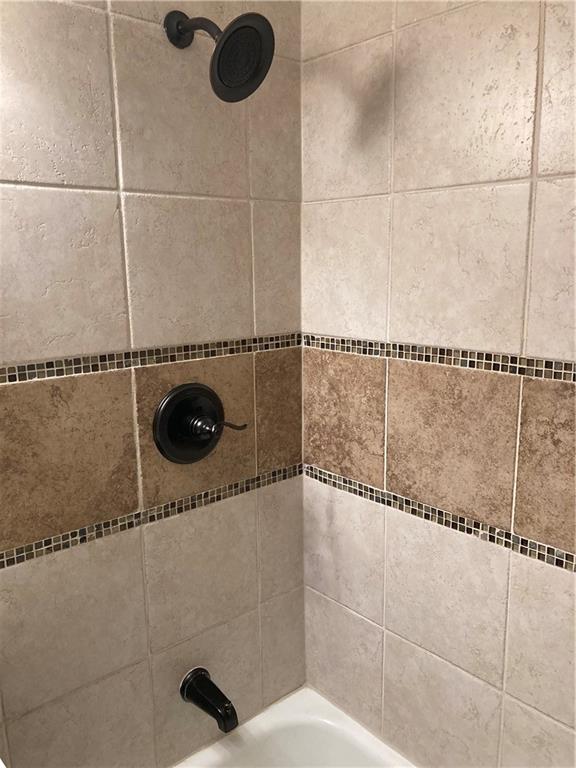 7909 Appleton Ave, Raytown, MO 64138 - bathroom view of bathtub / shower combination