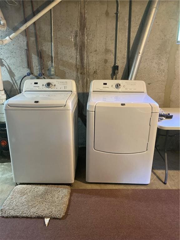 7909 Appleton Ave, Raytown, MO 64138 - washroom with separate washer and dryer