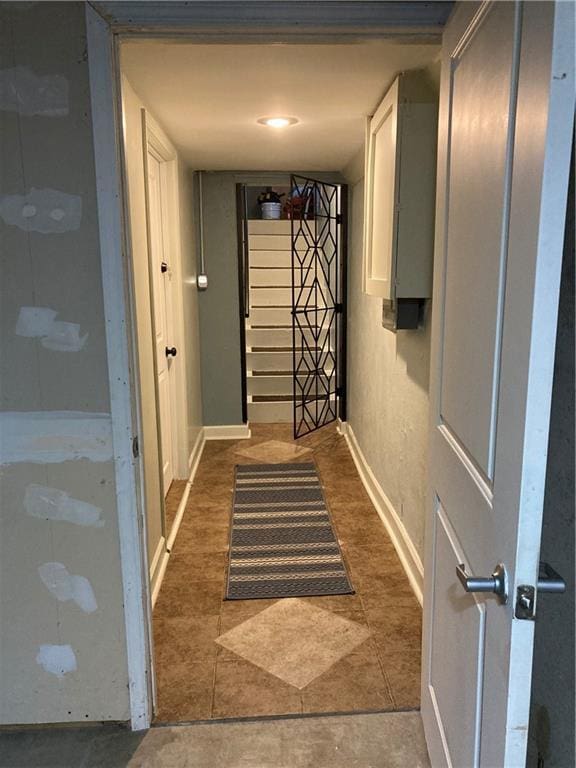 7909 Appleton Ave, Raytown, MO 64138 - doorway to outside with stairway and baseboards