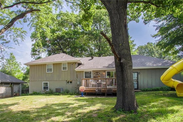 12508 Valley Brook Dr, Grandview, MO 64030 - rear view of house featuring a deck and roof with shingles