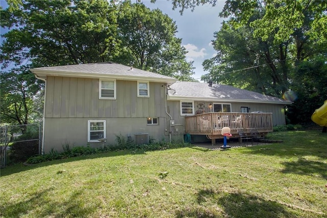 12508 Valley Brook Dr, Grandview, MO 64030 - back of property with a wooden deck and board and batten siding