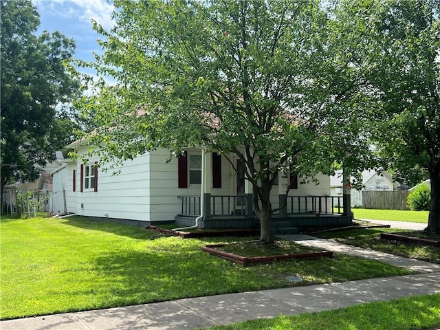 409 S Buckeye St, Iola, KS 66749 - view of front of property featuring a porch