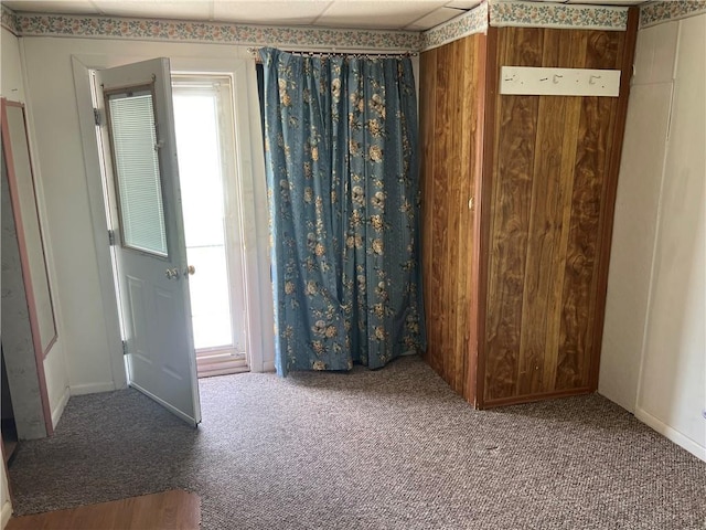 409 S Buckeye St, Iola, KS 66749 - carpeted spare room with plenty of natural light