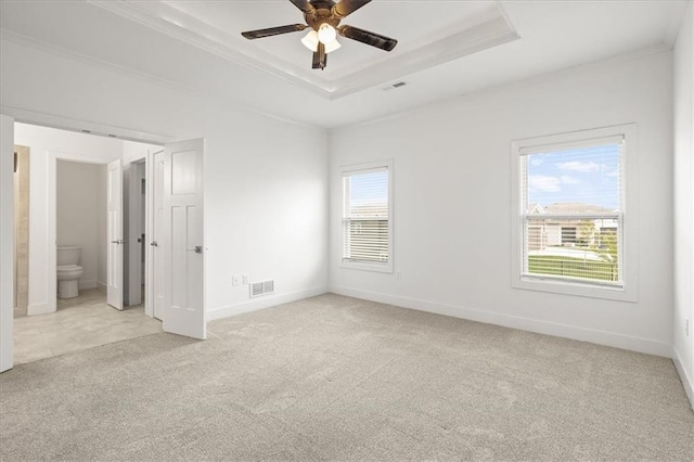 29702 W 195th St, Gardner, KS 66030 - spare room with a raised ceiling, light carpet, a ceiling fan, and crown molding