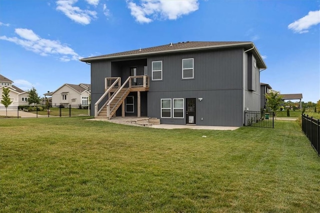 29702 W 195th St, Gardner, KS 66030 - back of property with stairs, a fenced backyard, and a patio