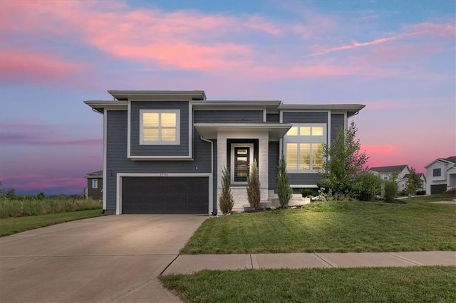 29702 W 195th St, Gardner, KS 66030 - view of front of property featuring a garage, driveway, and a lawn