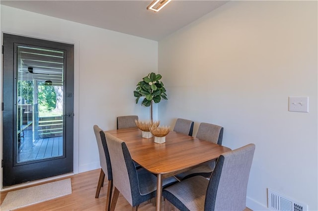 2031 N 75th St, Kansas City, KS 66109 - dining room with light wood-type flooring and baseboards