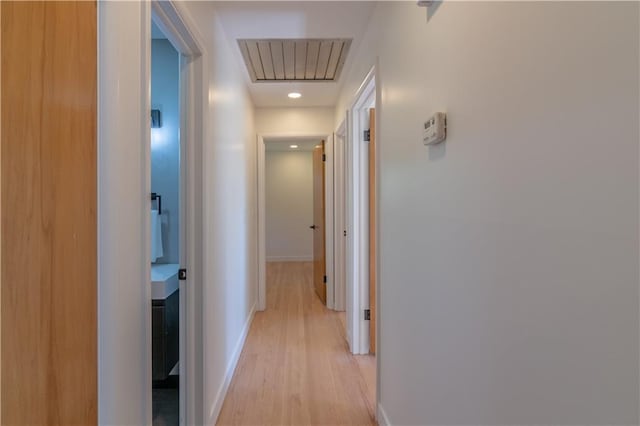2031 N 75th St, Kansas City, KS 66109 - corridor featuring light wood finished floors and recessed lighting