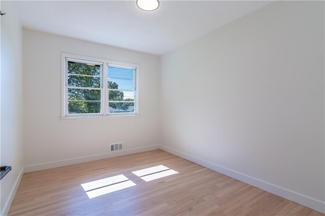 2031 N 75th St, Kansas City, KS 66109 - empty room featuring light wood-style floors and baseboards