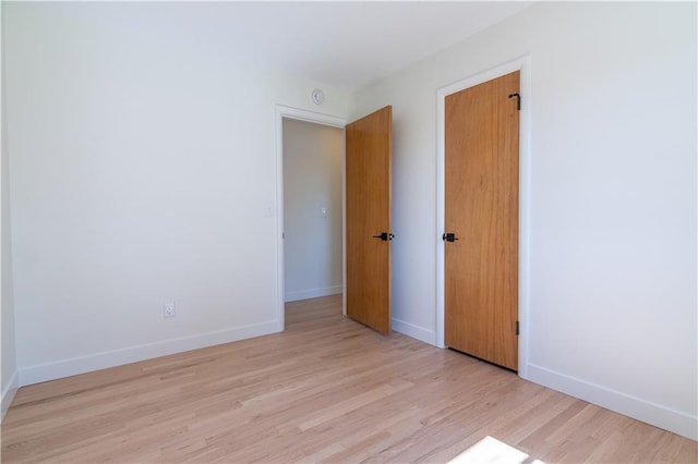 2031 N 75th St, Kansas City, KS 66109 - spare room featuring light wood-style floors and baseboards