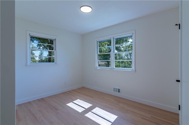 2031 N 75th St, Kansas City, KS 66109 - empty room with light wood-style flooring and baseboards