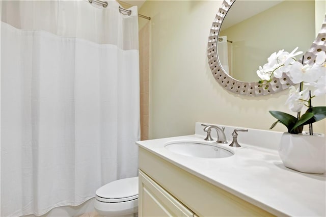 4900 Central St Unit 104, Kansas City, MO 64112 - full bathroom featuring vanity and toilet