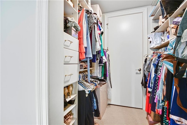 4900 Central St Unit 104, Kansas City, MO 64112 - walk in closet featuring carpet