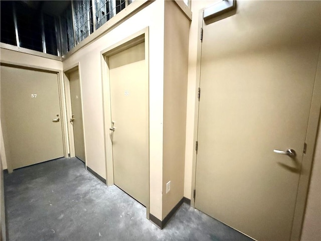 4900 Central St Unit 104, Kansas City, MO 64112 - hallway with concrete flooring