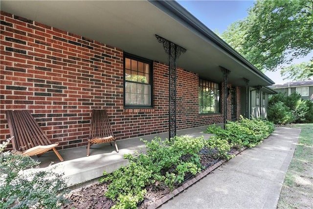 7100 Antioch Rd, Merriam, KS 66204 - view of property exterior featuring brick siding