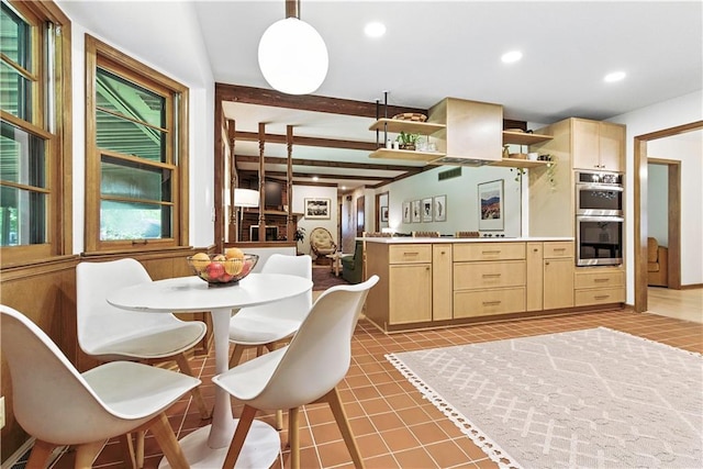 7100 Antioch Rd, Merriam, KS 66204 - kitchen with stainless steel double oven, light brown cabinets, open shelves, recessed lighting, and light countertops