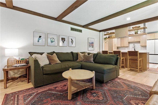 7100 Antioch Rd, Merriam, KS 66204 - living room with light wood-type flooring, beamed ceiling, and recessed lighting