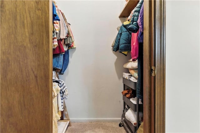 7100 Antioch Rd, Merriam, KS 66204 - walk in closet featuring carpet floors
