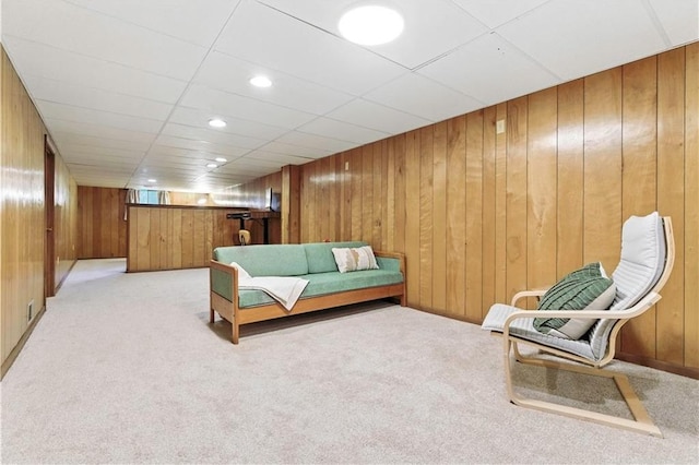 7100 Antioch Rd, Merriam, KS 66204 - living area featuring light carpet and wood walls