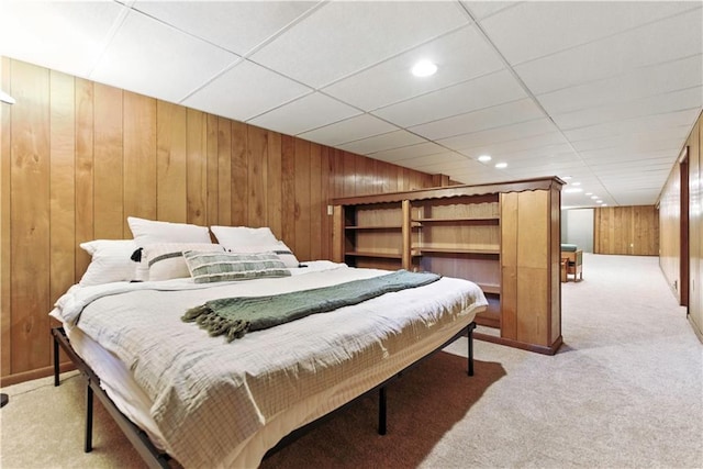 7100 Antioch Rd, Merriam, KS 66204 - bedroom with wooden walls, light carpet, and recessed lighting