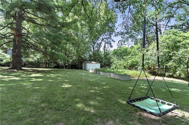 7100 Antioch Rd, Merriam, KS 66204 - view of green lawn featuring a shed