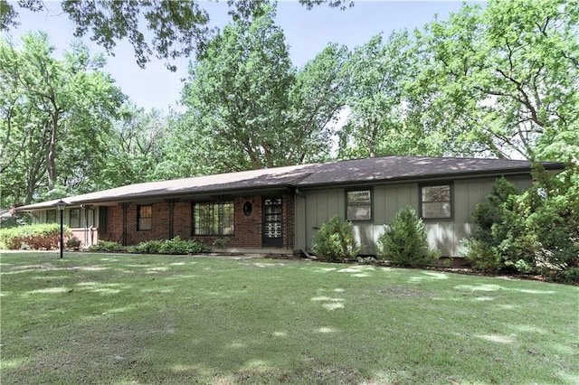 7100 Antioch Rd, Merriam, KS 66204 - view of front of property with a front lawn and brick siding