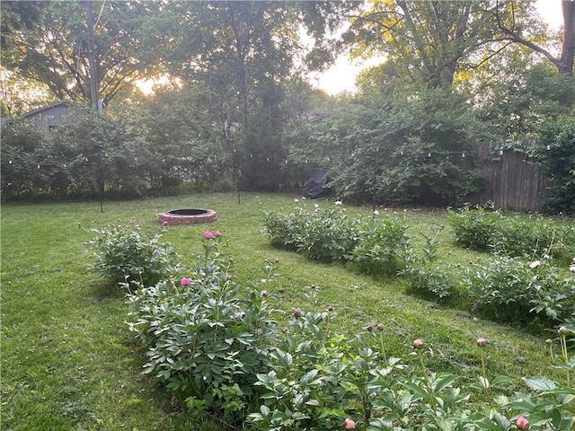 7100 Antioch Rd, Merriam, KS 66204 - view of yard with an outdoor fire pit