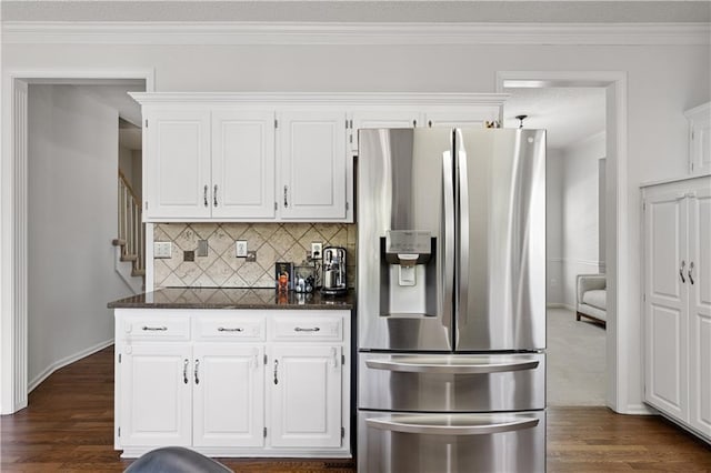 14162 W 150th Ct, Olathe, KS 66062 - kitchen with stainless steel fridge with ice dispenser, tasteful backsplash, ornamental molding, white cabinetry, and dark wood-type flooring