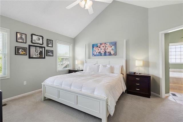 14162 W 150th Ct, Olathe, KS 66062 - bedroom with light colored carpet, high vaulted ceiling, ensuite bath, and ceiling fan