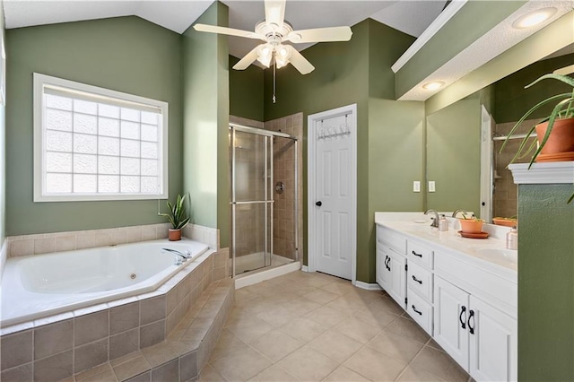 14162 W 150th Ct, Olathe, KS 66062 - full bath with a jetted tub, double vanity, a shower stall, a ceiling fan, and lofted ceiling