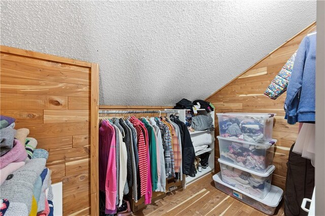 14162 W 150th Ct, Olathe, KS 66062 - walk in closet featuring lofted ceiling and wood finished floors