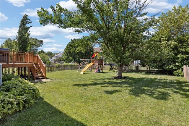 14162 W 150th Ct, Olathe, KS 66062 - fenced backyard featuring a playground, stairway, and a deck