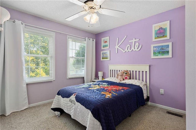 14162 W 150th Ct, Olathe, KS 66062 - bedroom with carpet flooring and a ceiling fan
