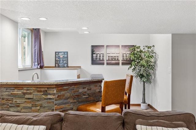 14162 W 150th Ct, Olathe, KS 66062 - indoor wet bar with a textured ceiling and recessed lighting