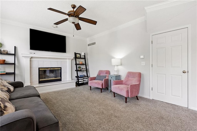 14162 W 150th Ct, Olathe, KS 66062 - carpeted living room with a ceiling fan, ornamental molding, and a fireplace
