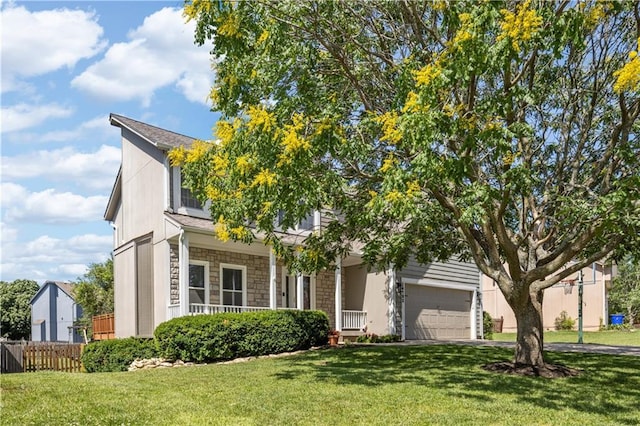 14162 W 150th Ct, Olathe, KS 66062 - view of property hidden behind natural elements featuring stone siding, covered porch, and driveway