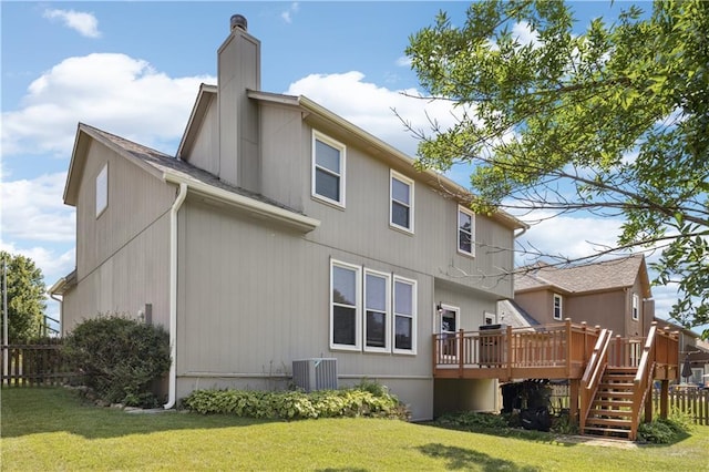 14162 W 150th Ct, Olathe, KS 66062 - rear view of house featuring a deck, a chimney, and roof with shingles