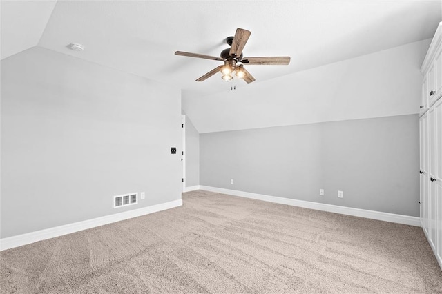 704 SW Admiral Byrd Dr, Lees Summit, MO 64082 - additional living space with lofted ceiling, ceiling fan, and carpet floors