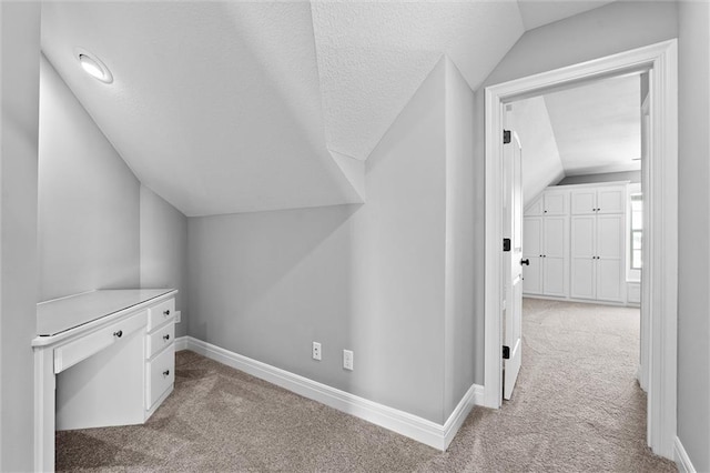 704 SW Admiral Byrd Dr, Lees Summit, MO 64082 - bonus room with vaulted ceiling and carpet floors