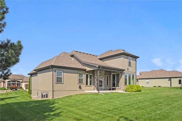 704 SW Admiral Byrd Dr, Lees Summit, MO 64082 - rear view of property featuring a yard, a patio area, and roof with shingles