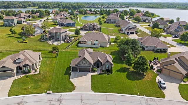 704 SW Admiral Byrd Dr, Lees Summit, MO 64082 - aerial perspective of suburban area featuring a large body of water