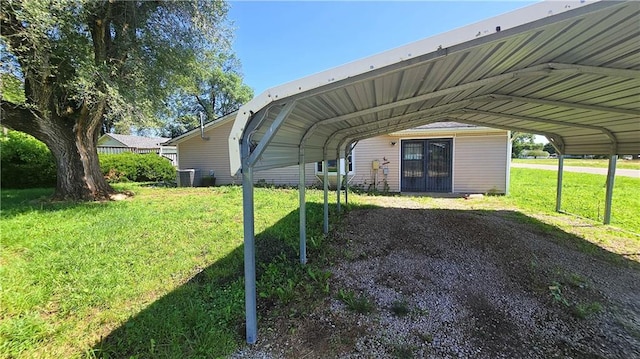 1443 215th St, Fort Scott, KS 66701 - view of vehicle parking with a carport